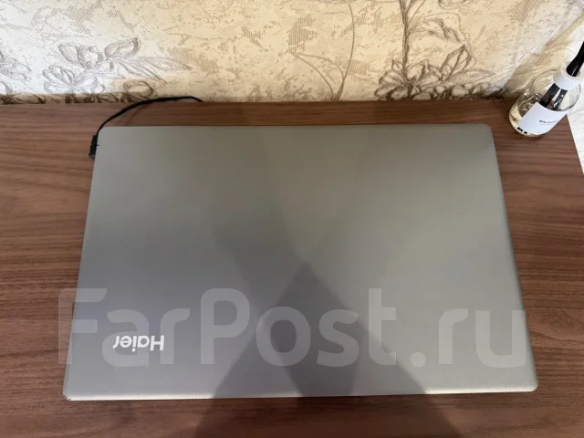 Haier. 15.6", 2,8����, ��� 4 ��, ���� 128���, WiFi: 1, Bluetooth: 1, ����������� �� 5��. ����