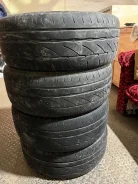 Bridgestone Potenza RE002 Adrenalin. ������, �/�, ����� 50 % ����