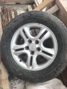 ����� ������ � ���� �� Kia Sportage 235/60/16 ����