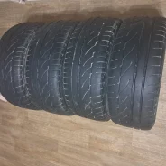 Bridgestone Potenza RE002 Adrenalin. ������, �/�, ����� 50 %. �������� ������� ����