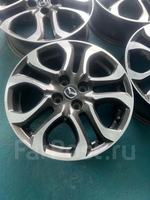 Mazda. 5.5x16", 4x100, ET40 ����