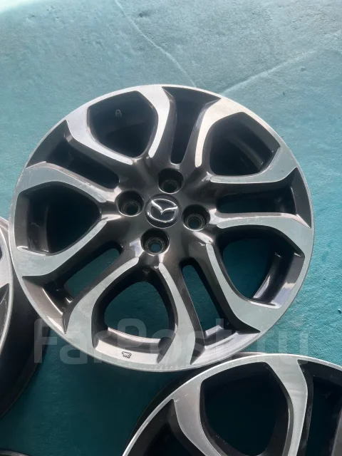 Mazda. 5.5x16", 4x100, ET40 ����