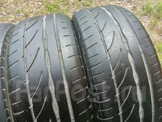 Bridgestone Potenza RE002 Adrenalin. ������, �/�, ����� 40 % ����