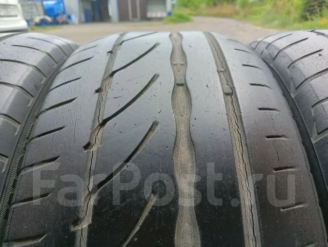 Bridgestone Potenza RE002 Adrenalin. ������, �/�, ����� 40 % ����