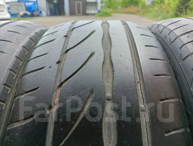 Bridgestone Potenza RE002 Adrenalin. ������, �/�, ����� 40 % ����