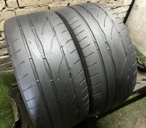 Bridgestone Potenza RE002 Adrenalin. ������, �/�, ����� 40 % ����