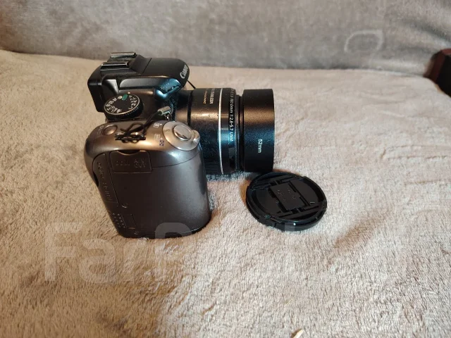 Canon PowerShot SX20 IS. 10 - 14.9 ��, ���: 14� � ����� ����