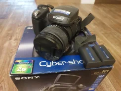 Sony Cyber-shot DSC-R1. 10 - 14.9 �� ����