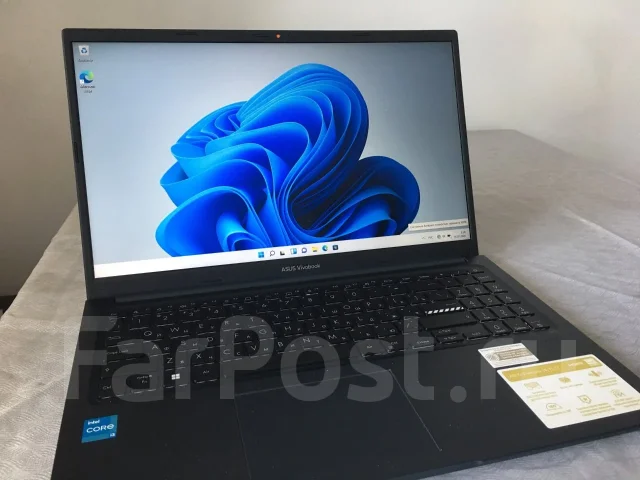 Asus VivoBook 15. 15", 2,2����, ��� 8 ��, ���� 256���, WiFi: 1, Bluetooth: 1, ����������� �� 5��. ����