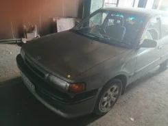 Mazda Familia. ��������, ��������, 1.0 (120��.�.), ������, 350 000����. �� ����
