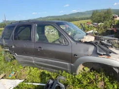 Mazda Tribute. AJ ����