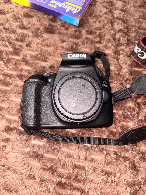 Canon EOS 2000D. 20 � ����� �� ����