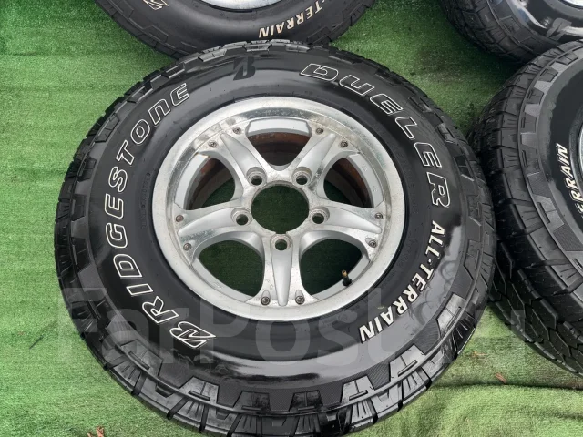 Bridgestone Dueler A/T 002. ����� at, 2024 ���, �/�, ����� 5 % ����
