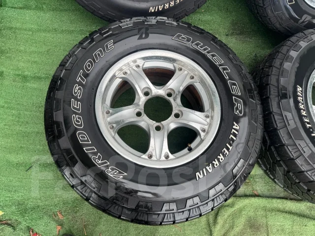 Bridgestone Dueler A/T 002. ����� at, 2024 ���, �/�, ����� 5 % ����