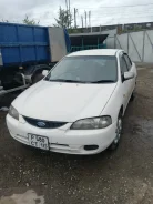 Ford Laser. �������, ��������, 1.5 (110��.�.), ������, 325 000����. �� ����