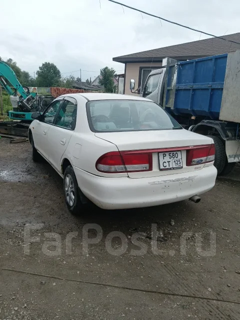 Ford Laser. �������, ��������, 1.5 (110��.�.), ������, 325 000����. �� ����