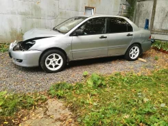 Mitsubishi Lancer. 4G18 ����